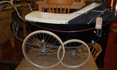 Lot 1323 - A mid 20th century baby's pram