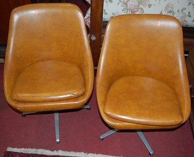 Lot 1336 - A set of four 1960s tan vinyl upholstered...