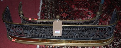 Lot 1343 - Two small 19th century pierced brass fenders