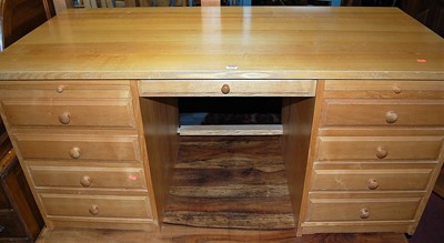 Lot 1345 - A contemporary ash kneehole writing desk,...