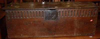 Lot 1353 - An antique boarded oak six plank coffer, of...