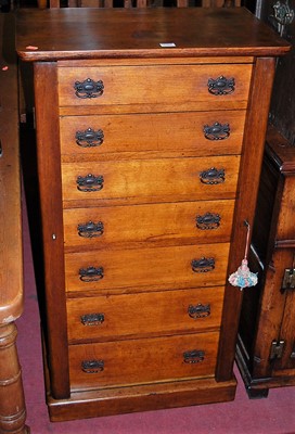 Lot 1355 - A Victorian oak round cornered seven drawer...
