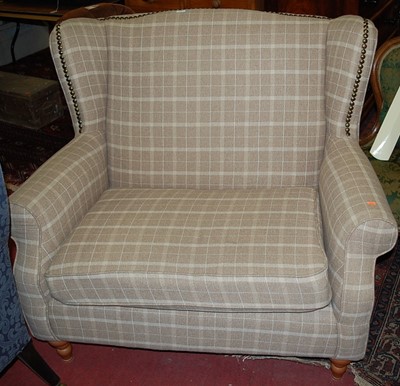Lot 1383 - A contemporary chequer upholstered and studded...
