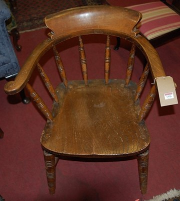 Lot 1396 - An early 20th century elm seat and beech...