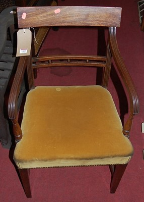 Lot 1403 - A 19th century mahogany bar back elbow chair;...