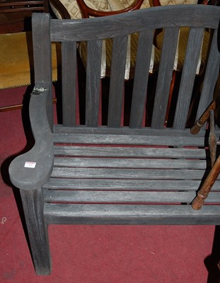 Lot 1405 - A contemporary stained and slatted teak...