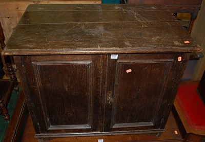 Lot 1421 - An early 20th century oak double door low side...