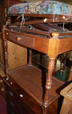 Lot 1441 - A contemporary oak single drawer two-tier tea...