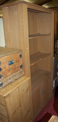 Lot 1448 - A contemporary light oak freestanding open...