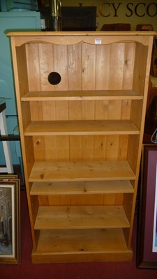 Lot 1450 - A modern pine freestanding open bookshelf,...