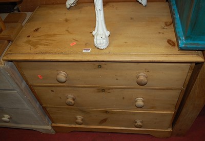 Lot 1454 - A Victorian pine chest of three long graduated...