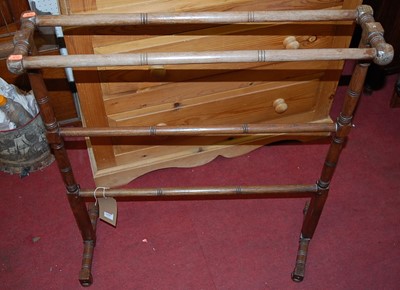 Lot 1439 - An Edwardian turned walnut towel rail, width...