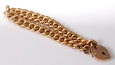 Lot 353 - A rolled gold curblink bracelet