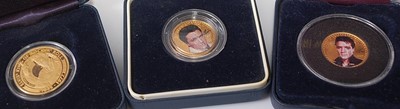 Lot 365 - Three Elvis Presley gold commemorative coins,...