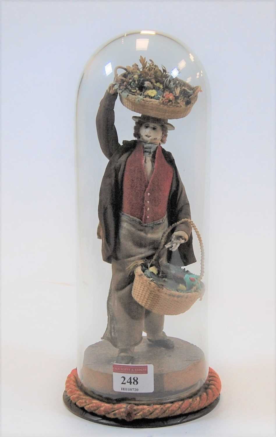 Lot 248 - An early 20th century wire framed doll in the...