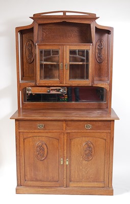Lot 291 - An Arts & Crafts oak dresser, the upper...