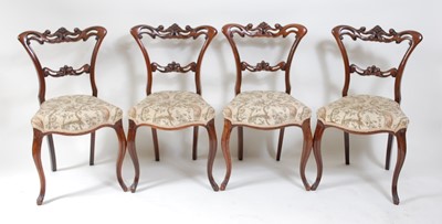 Lot 1494 - A set of four Victorian rosewood salon chairs,...