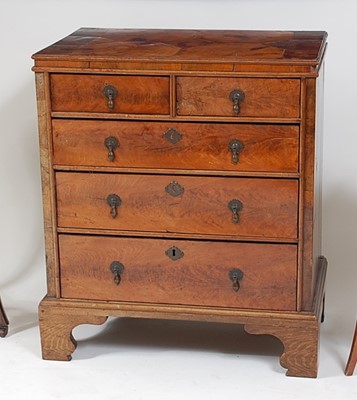 Lot 1575 - An antique walnut and oyster veneered chest,...