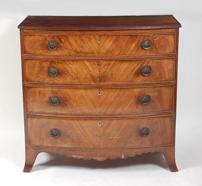 Lot 1537 - A Regency mahogany bowfront chest, the top...