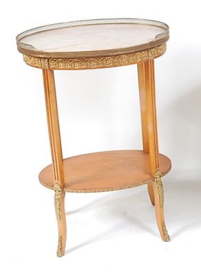 Lot 1539 - A circa 1900 French satinwood and gilt metal...