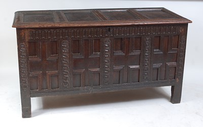 Lot 1526 - A circa 1700 joined oak four panel coffer, the...