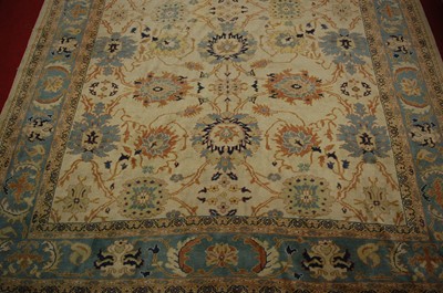 Lot 1505 - A Turkish Ushak woollen carpet, the cream...