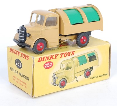 Lot 1980 - A Dinky Toys No. 252 Refuse truck comprising...