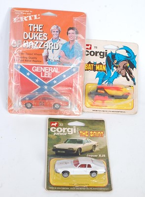 Lot 1629 - A Corgi Toys and ERTL carded diecast vehicle...