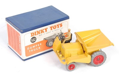 Lot 1987 - A Dinky Toys No. 562 dumper truck, comprising...