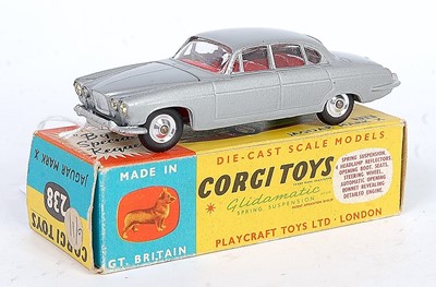 Lot 1632 - A Corgi Toys No. 238 Jaguar Mk 10 comprising...