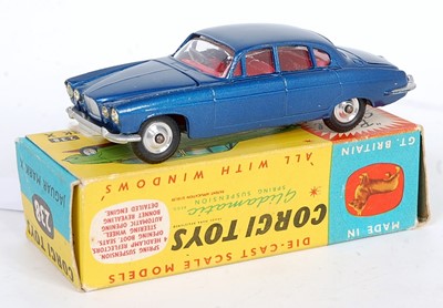 Lot 1634 - A Corgi Toys No. 238 Jaguar Mk 10 comprising...