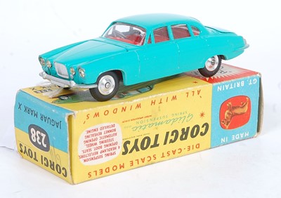 Lot 1635 - A Corgi Toys No. 238 Jaguar Mk10 comprising of...