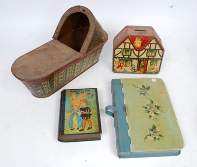 Lot 3245 - A novelty tinplate mixed group to include a...