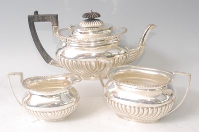 Lot 1133 - A late Victorian silver three-piece tea set,...