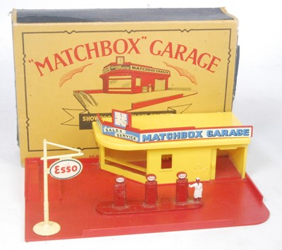 Lot 2338 - A Matchbox garage comprising of red base plate...