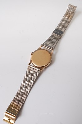 Lot 2570 - A yellow metal Record manual wind wristwatch,...
