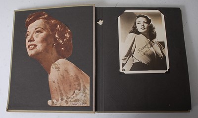 Lot 637 - An album of photographs and postcards