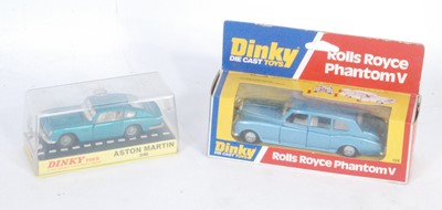 Lot 2027 - A Dinky Toys boxed saloon diecast group to...