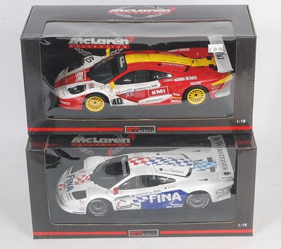 Lot 2759 - A UT Models Maclaren Collection boxed race car...