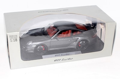 Lot 2503 - A Norev boxed Porsche design driver's...