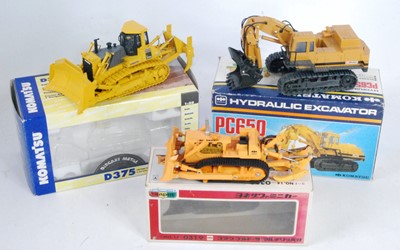 Lot 2777 - A Komatsu mainly 1/50 scale earth moving...