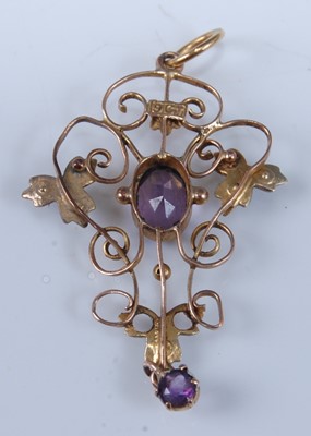 Lot 2637 - An Edwardian yellow metal openwork pendant,...