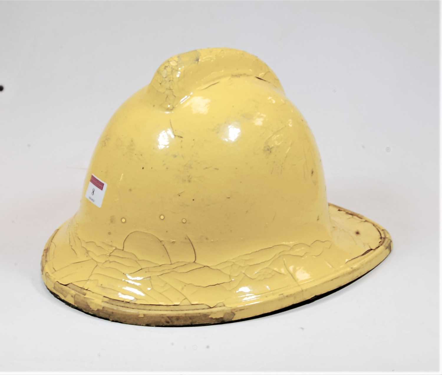 Lot 8 - A yellow painted fireman's helmet, size medium,...