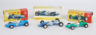 Lot 2041 - A Dinky Toys boxed racing car diecast group to...