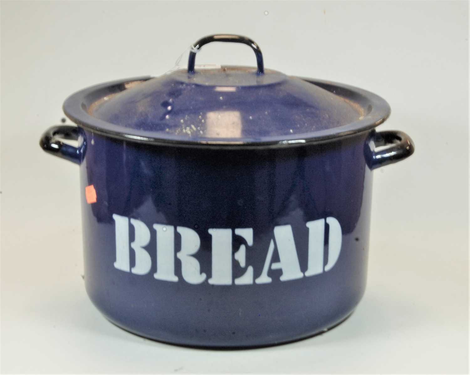 Lot 21 - A blue enamelled twin handled bread bin and...