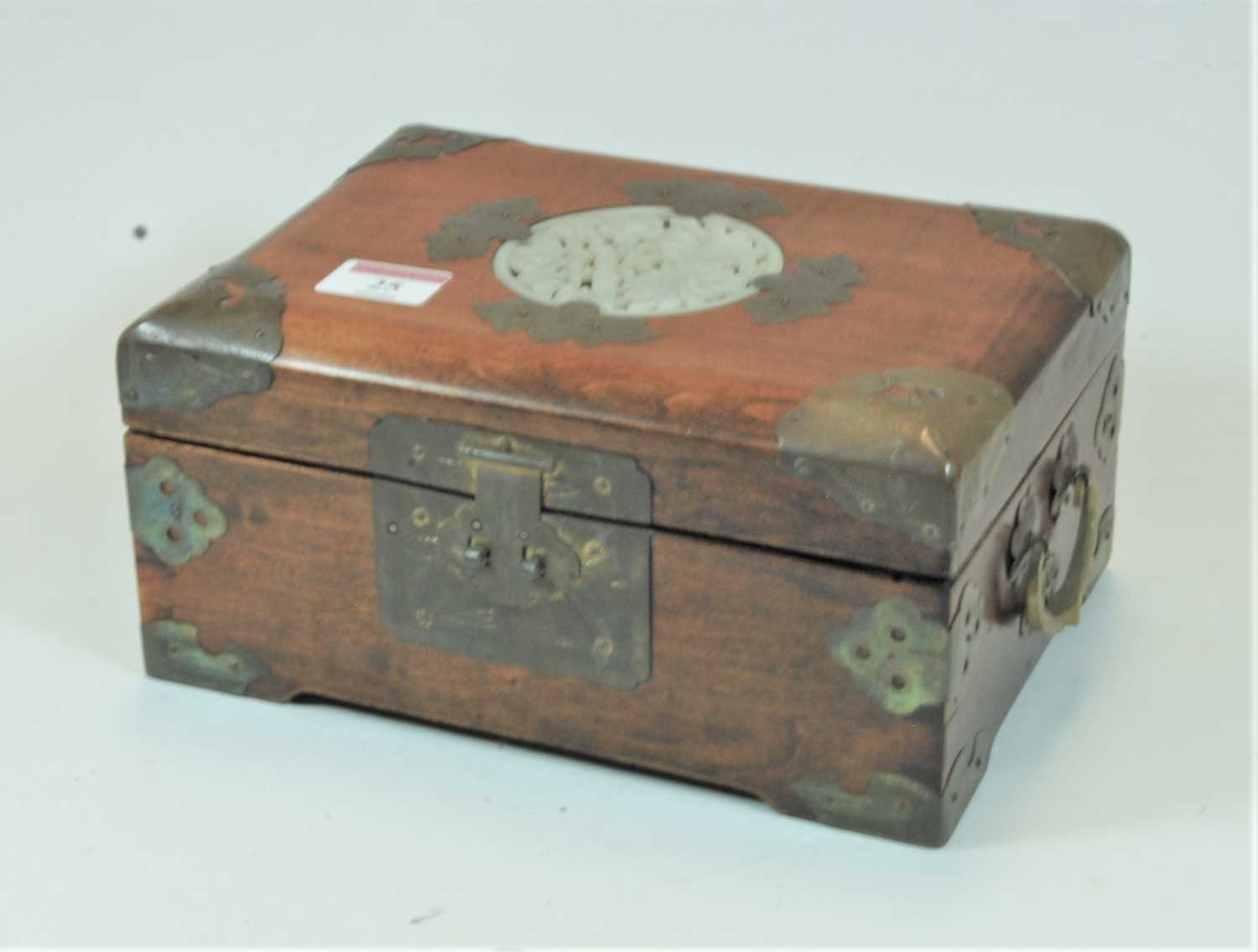 Lot 25 - A Chinese hardwood and brass mounted work box,...