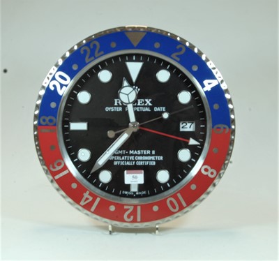 Lot 50 - A wall clock in the form of a Rolex Oyster...
