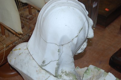 Lot 107 - A weathered carved white marble head and...