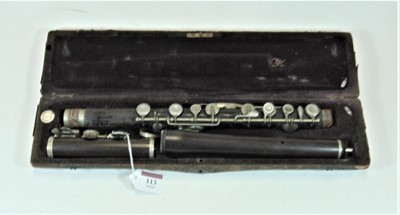 Lot 113 - A rosewood flute, in fitted case bearing a...