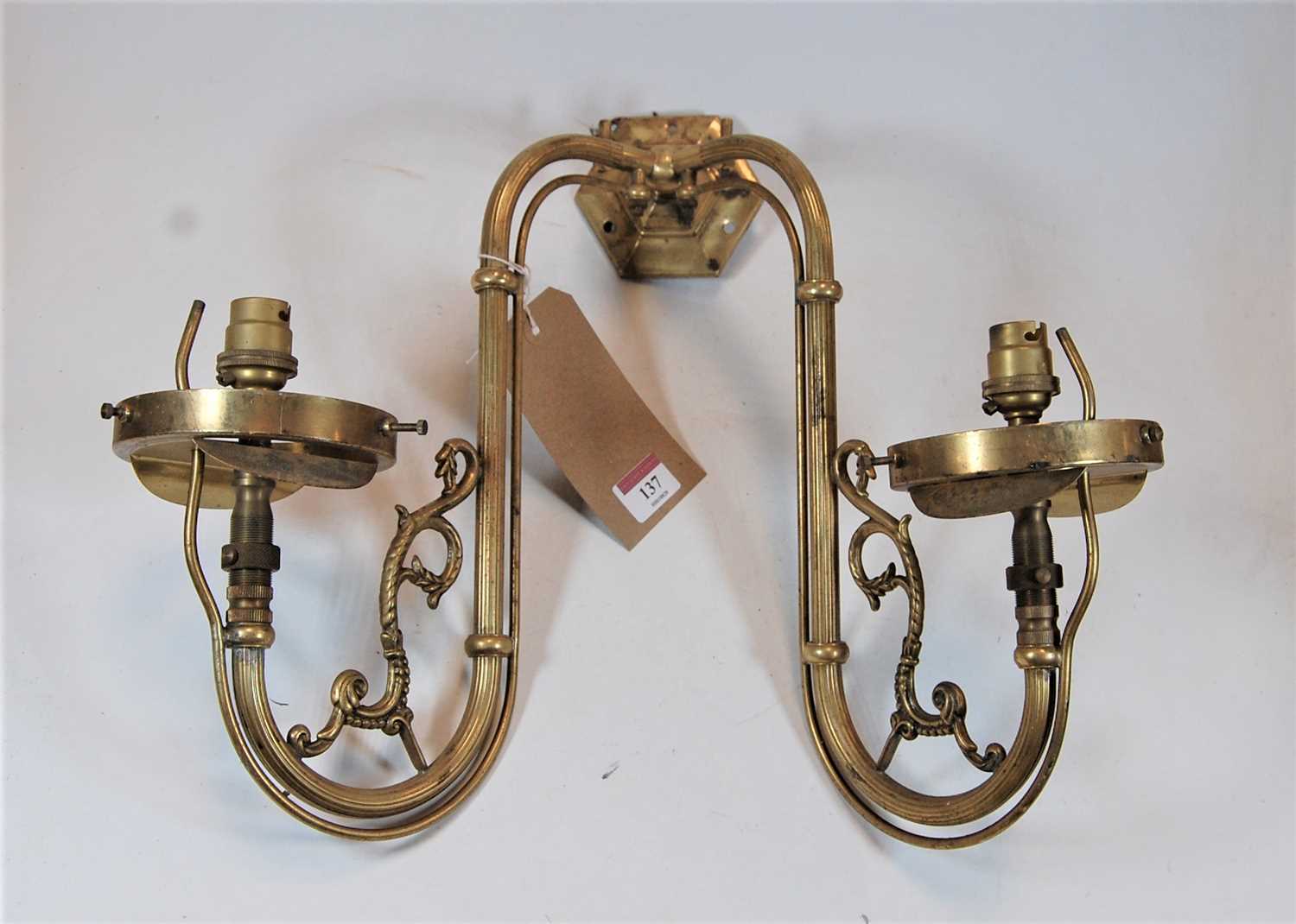 Lot 137 - A French style brass twin sconce wall light...